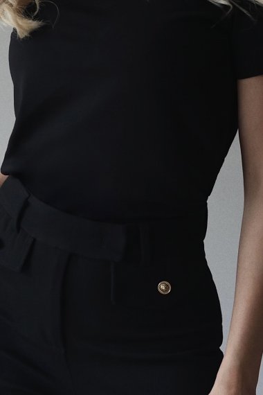 High-waist trousers with buttons
